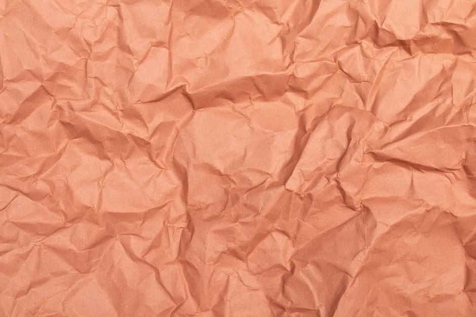 赪霞 — High-resolution crumpled orange paper texture for creative design projects.