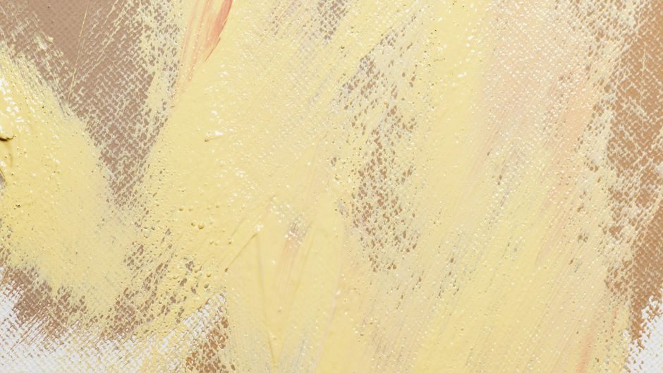 缣缃 — A close-up of an abstract painting with yellow and beige textured strokes on canvas.