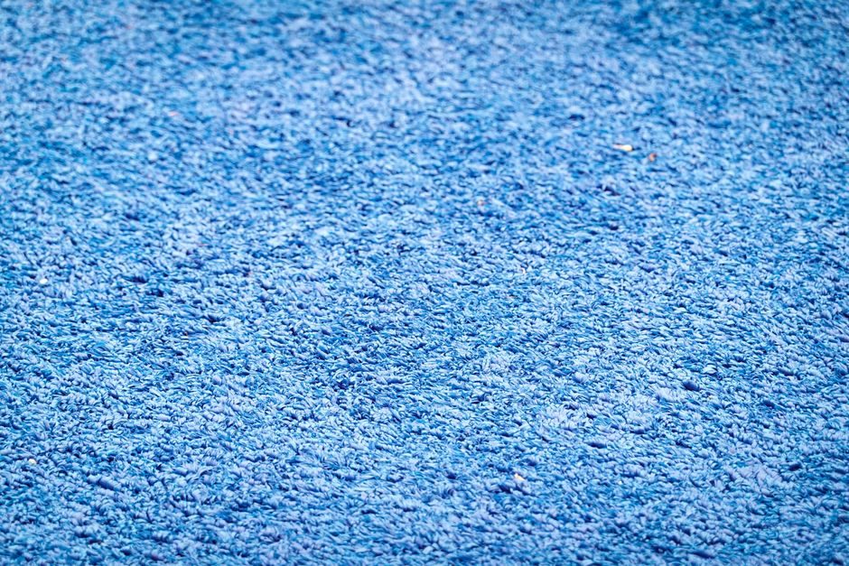 窃蓝 — Detailed blue textured fabric surface providing ample copy space for designs or text overlays.