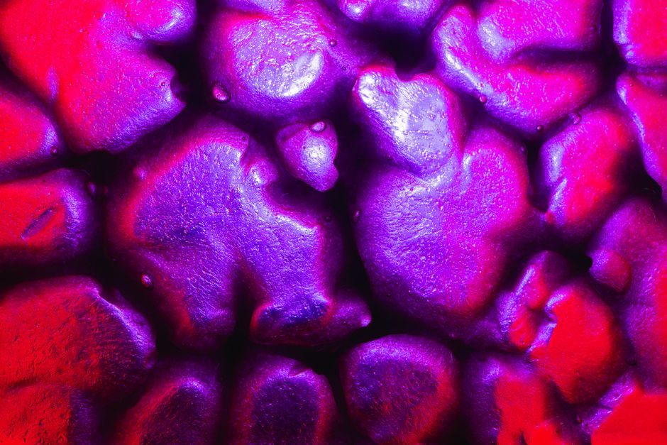 油紫 — A surreal close-up of a colorful, futuristic texture featuring neon and fluorescent hues.